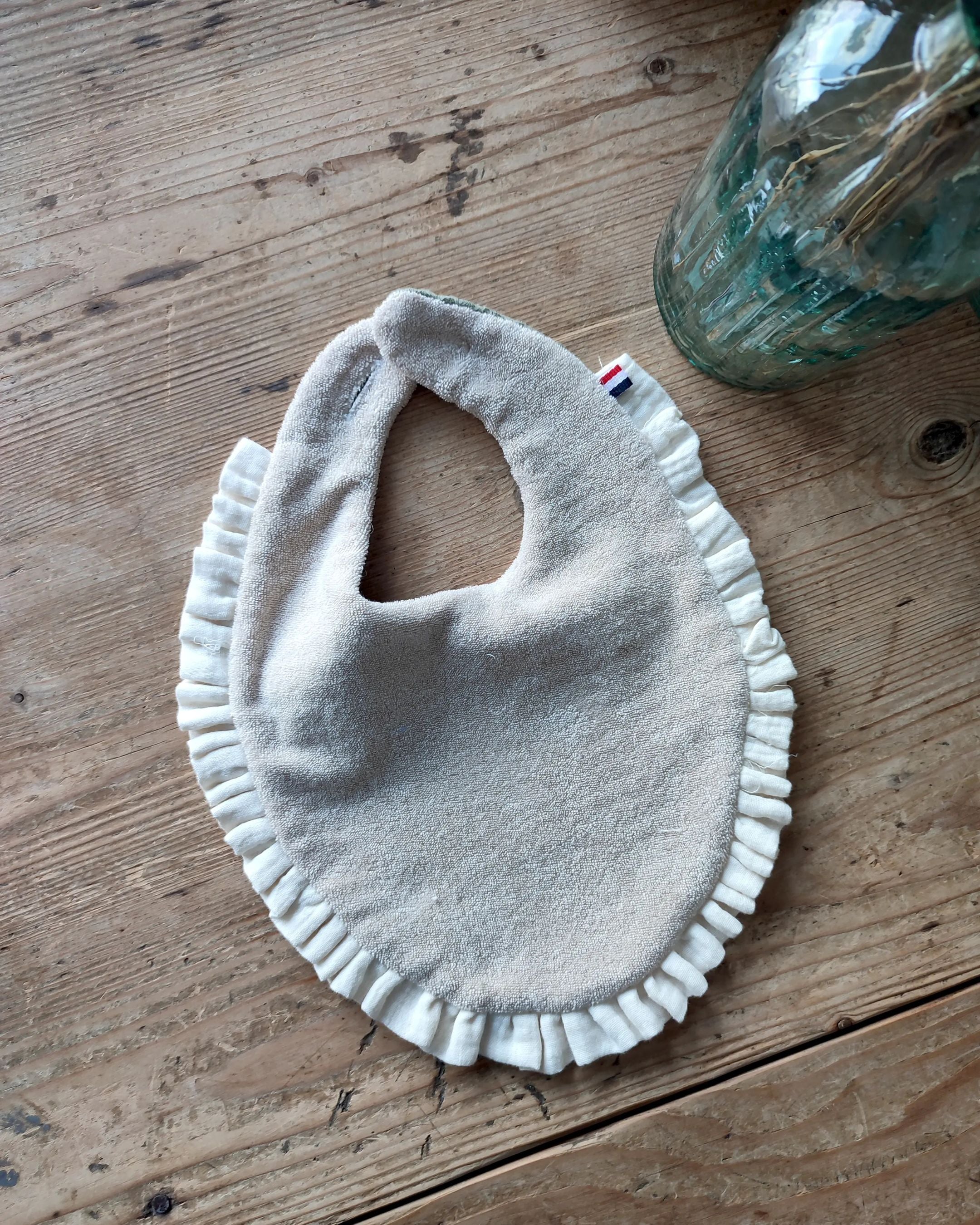 Verso du bavoir bébé en éponge OEKOTEX