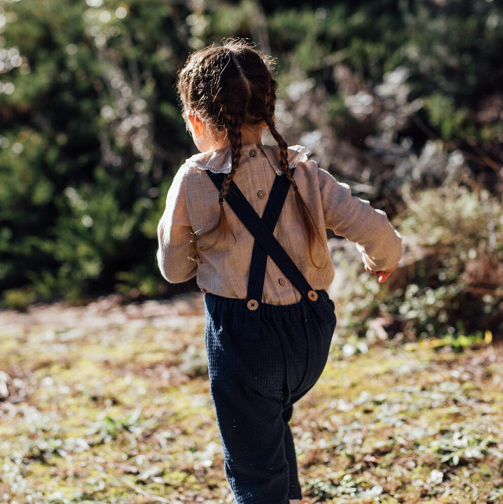 salopette enfant nid d'abeille couleur marine. Coton bio GOTS et made in France.
