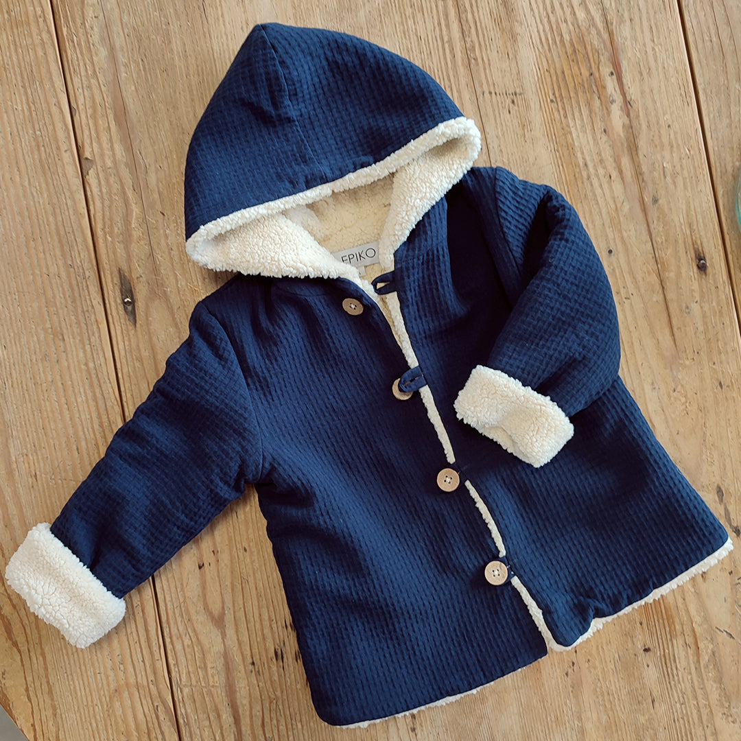 Veste enfant en nid abeille bleu marine, sherpa écru
